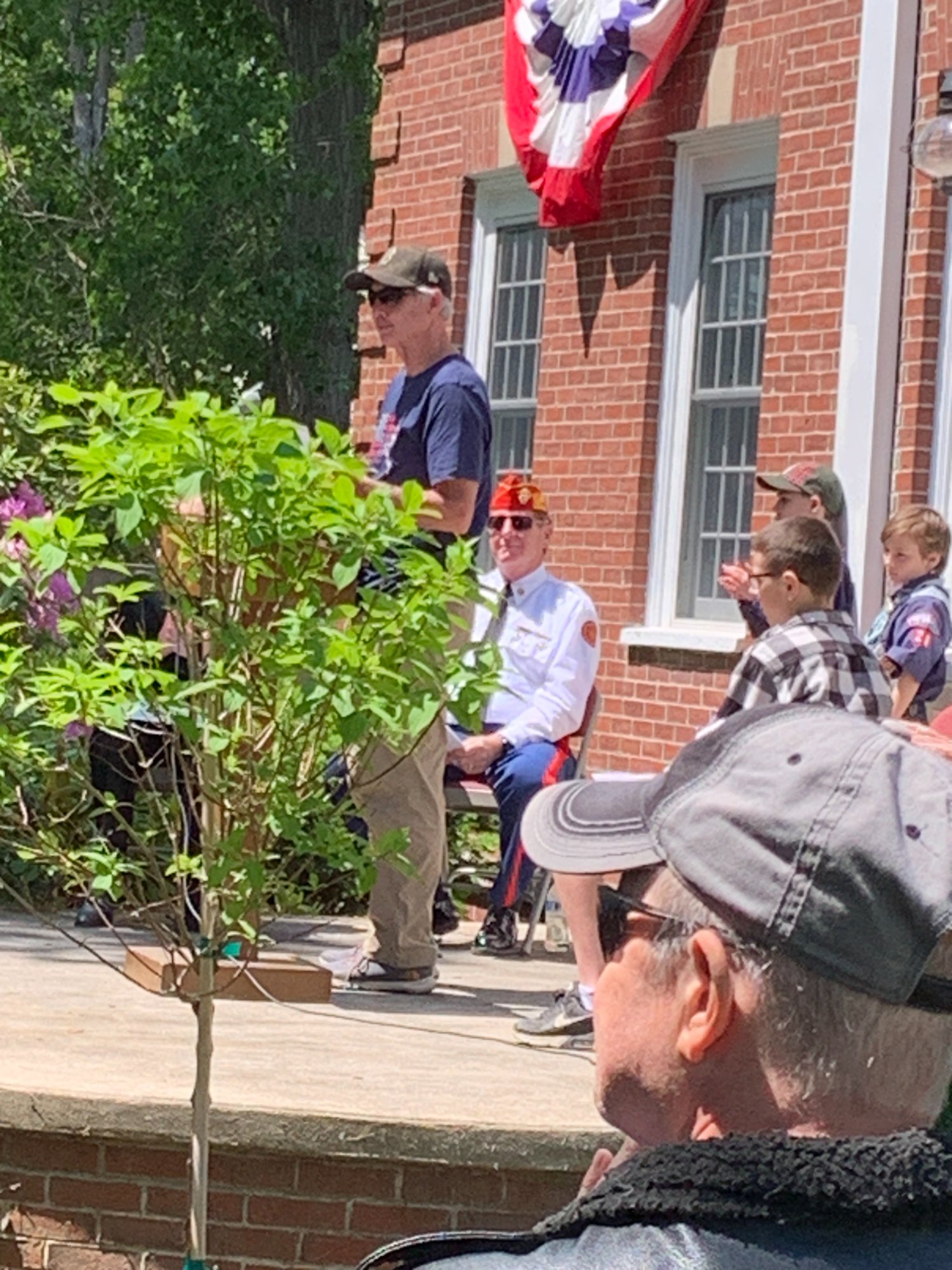 Speaking at the Memorial Day service